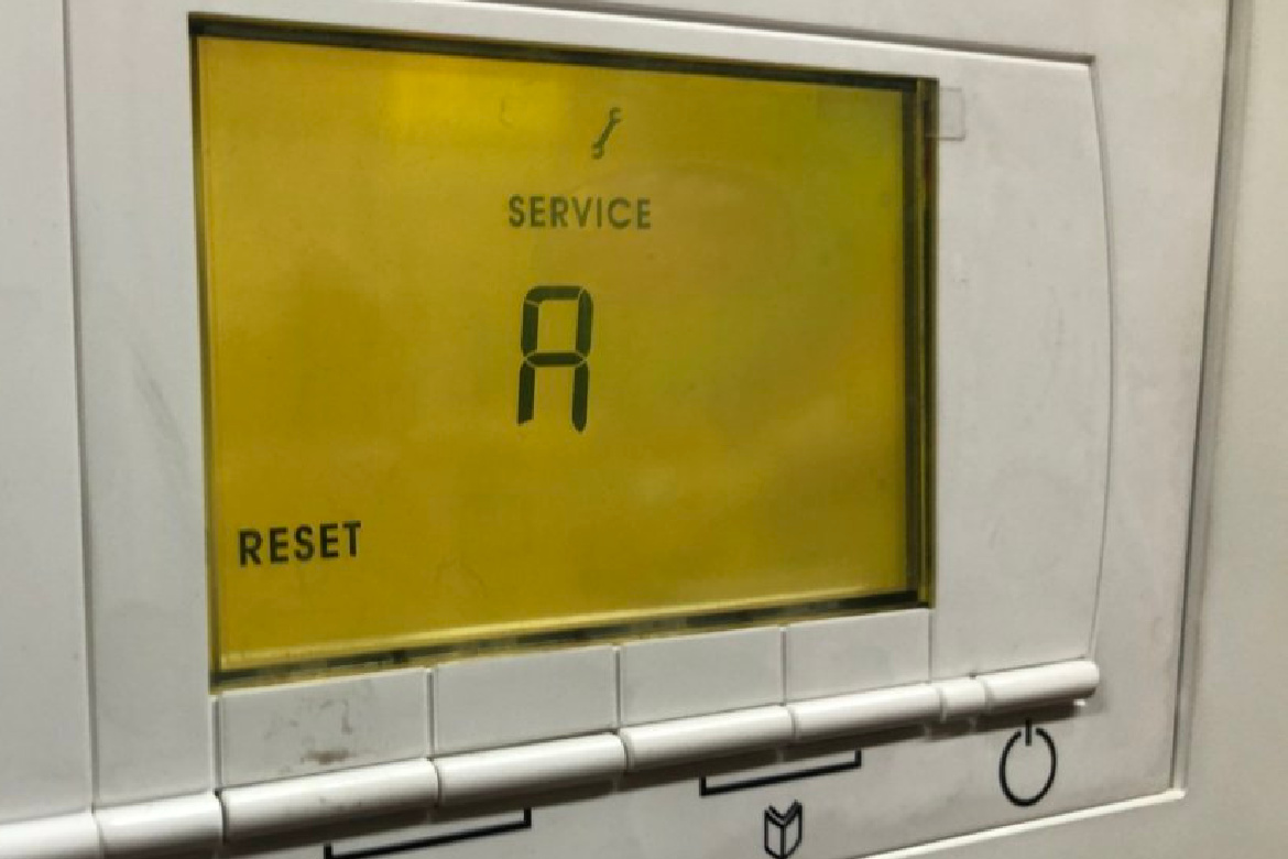 N4 Gas engineer servicing a boiler